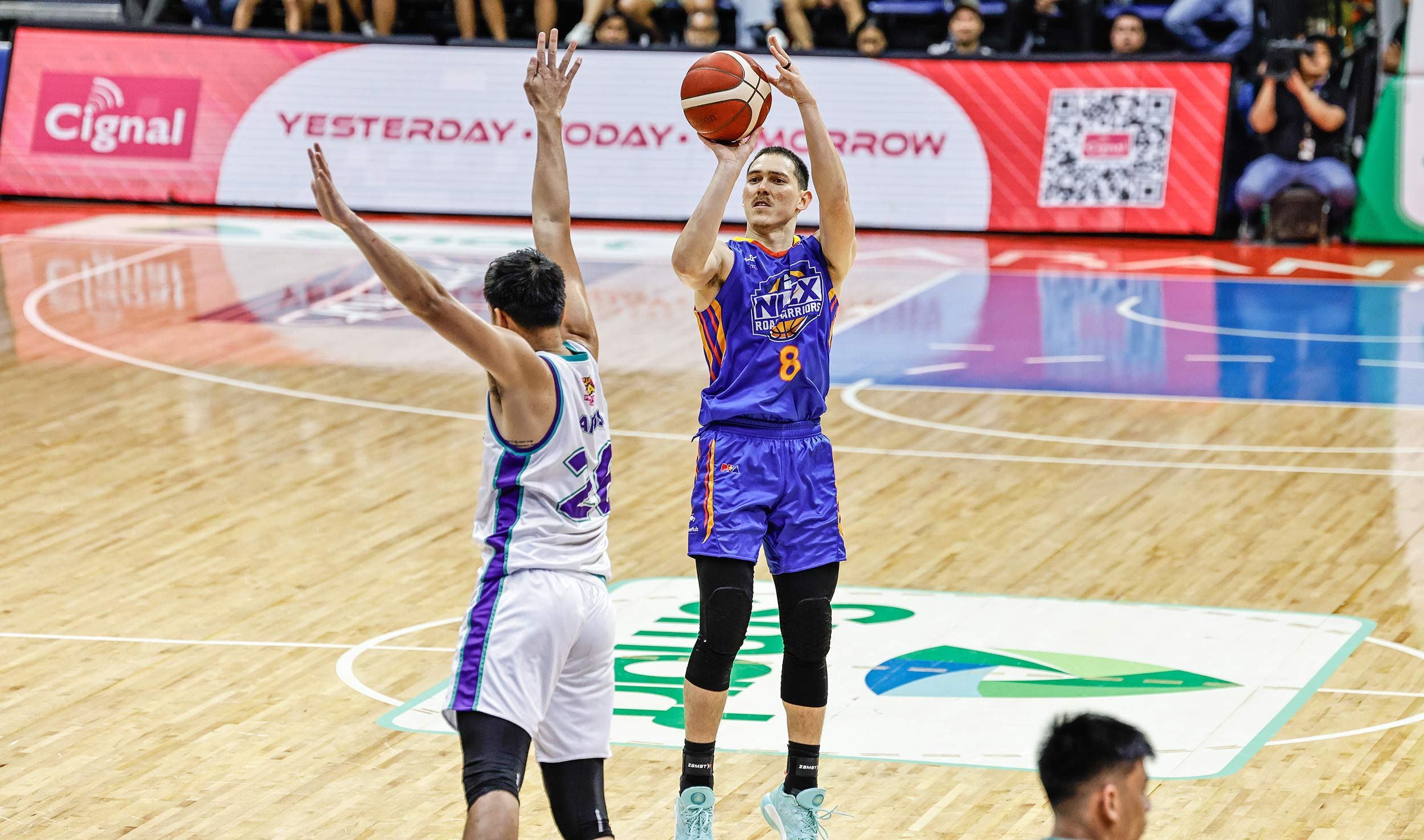 NLEX guard Robert Bolick puts up a jump shot against the Converge FiberXers in their elimination round game in the 2024 PBA Commissioner's Cup on March 9, 2024 at the Araneta Coliseum. PBA Images